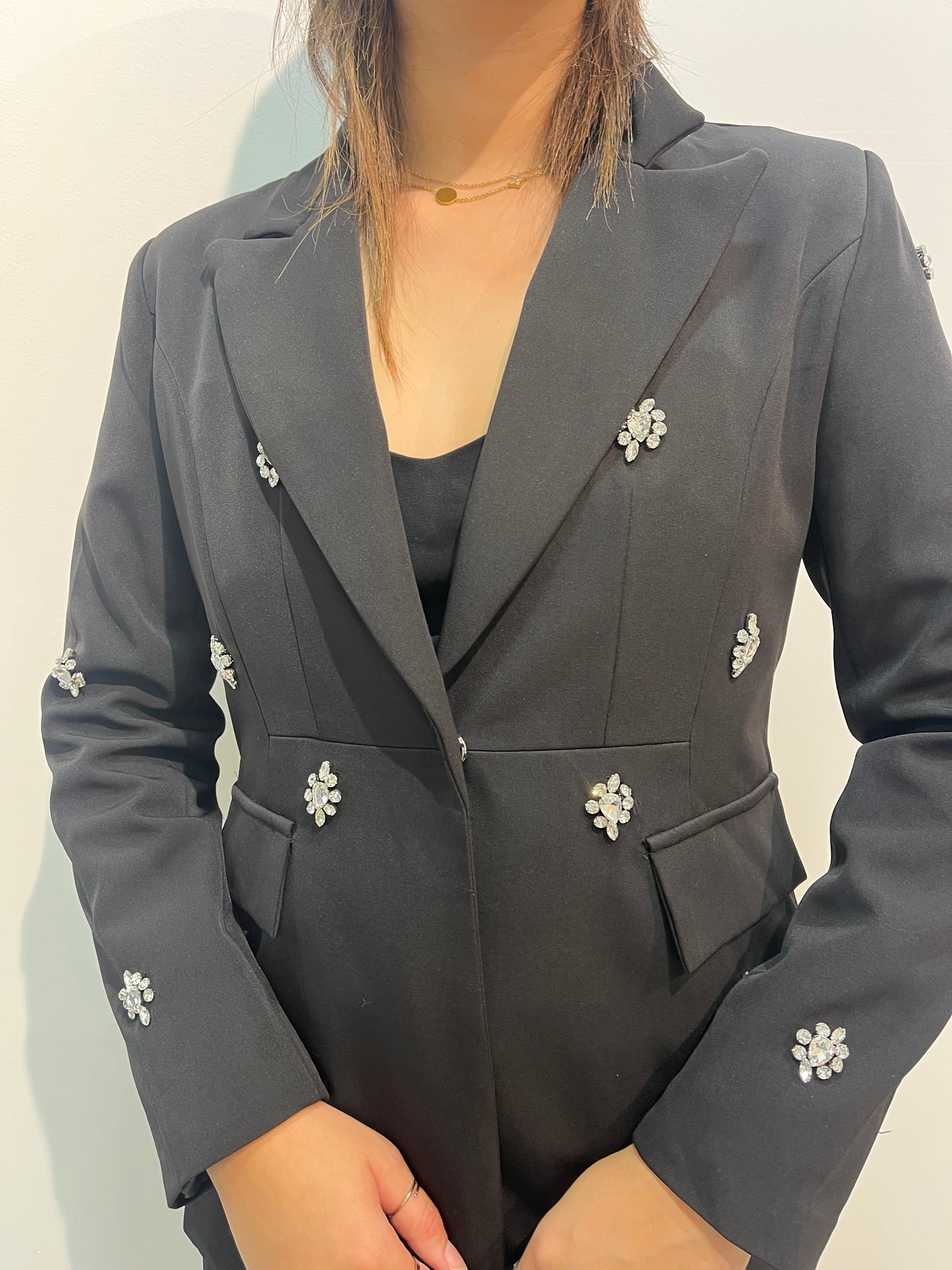 Blazer noir avec détails à strass