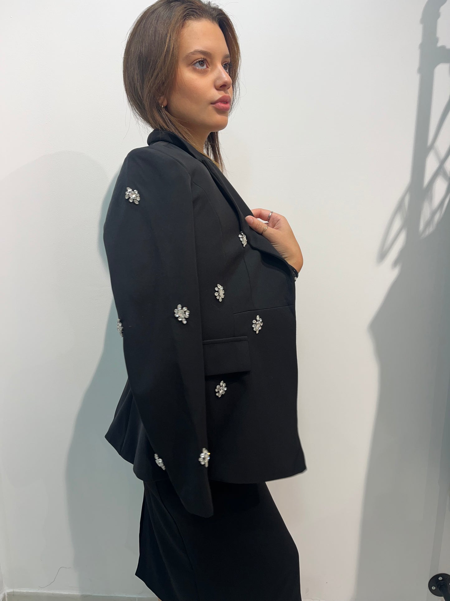 Blazer noir avec détails à strass