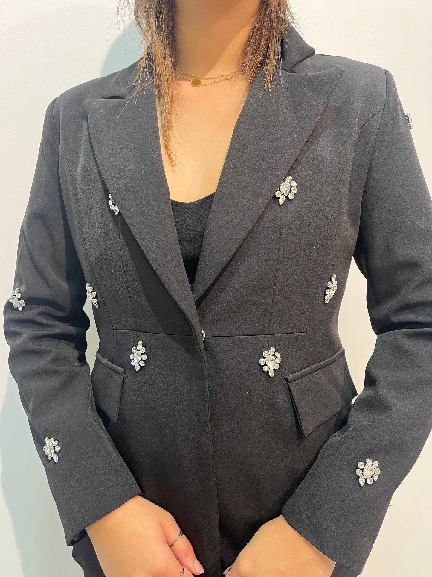 Blazer noir avec détails à strass