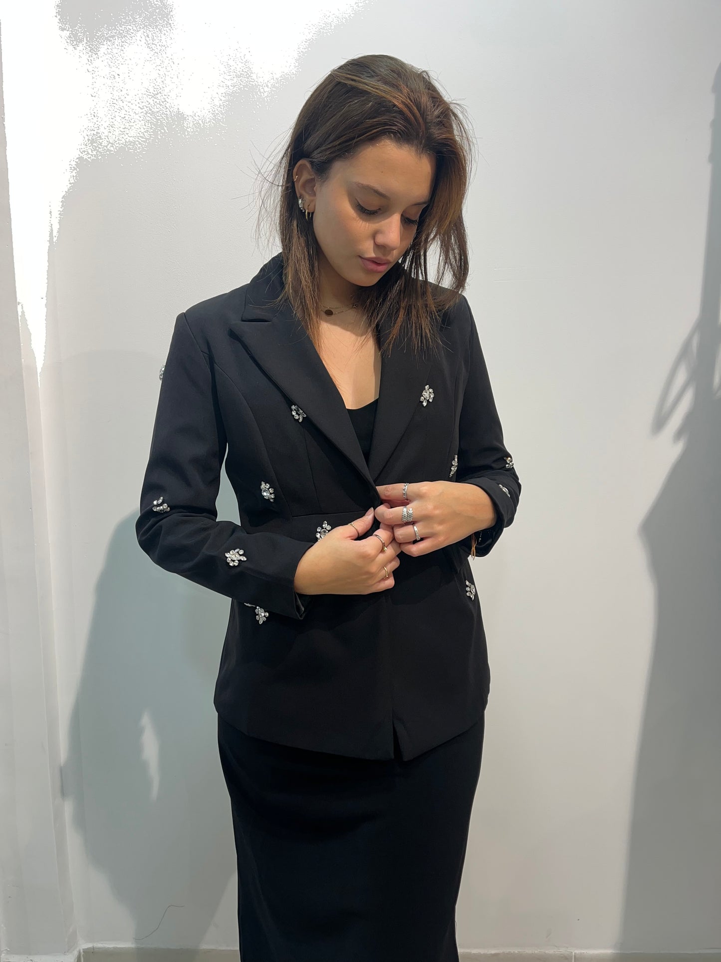Blazer noir avec détails à strass